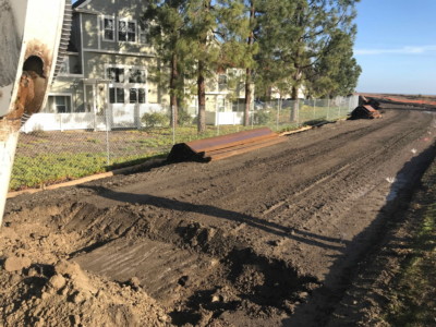 Smooth soil to prepare for sheet pile installation
